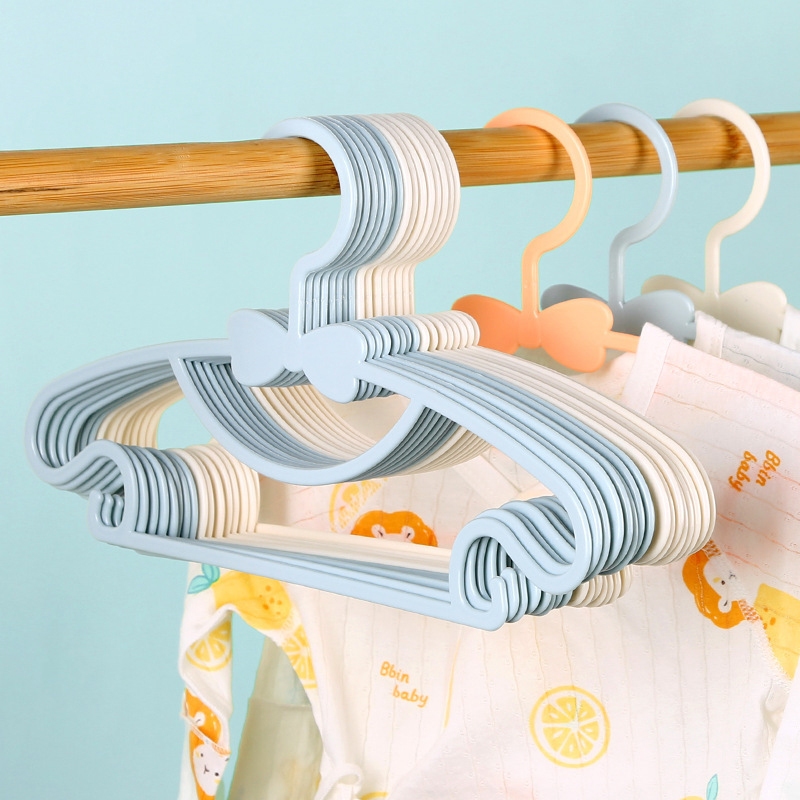 10 個かわいいちょう結び子供ハンガーポータブルプラスチック - Baby Clothing Display のレビューと価格