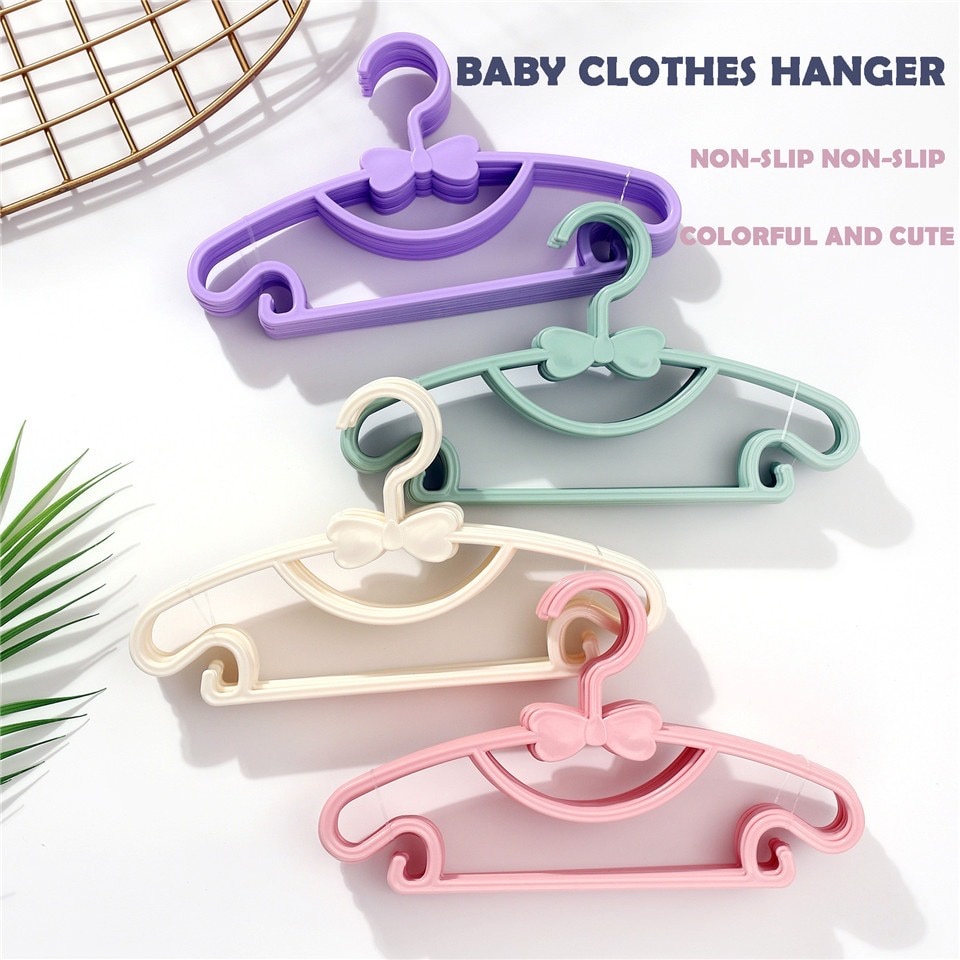 10 個かわいいちょう結び子供ハンガーポータブルプラスチック - Baby Clothing Display のレビューと価格